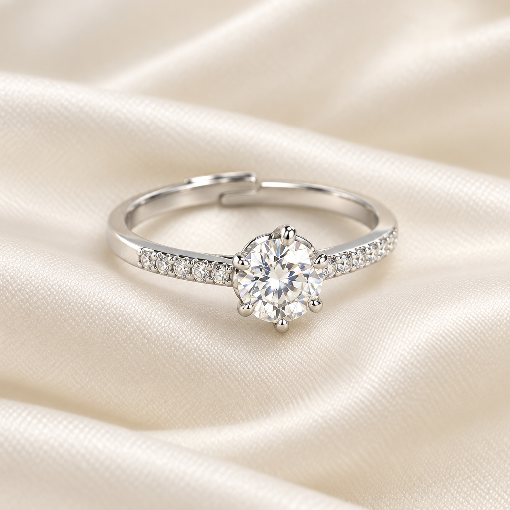 Round Moissanite solitaire with stone-set band on ivory satin