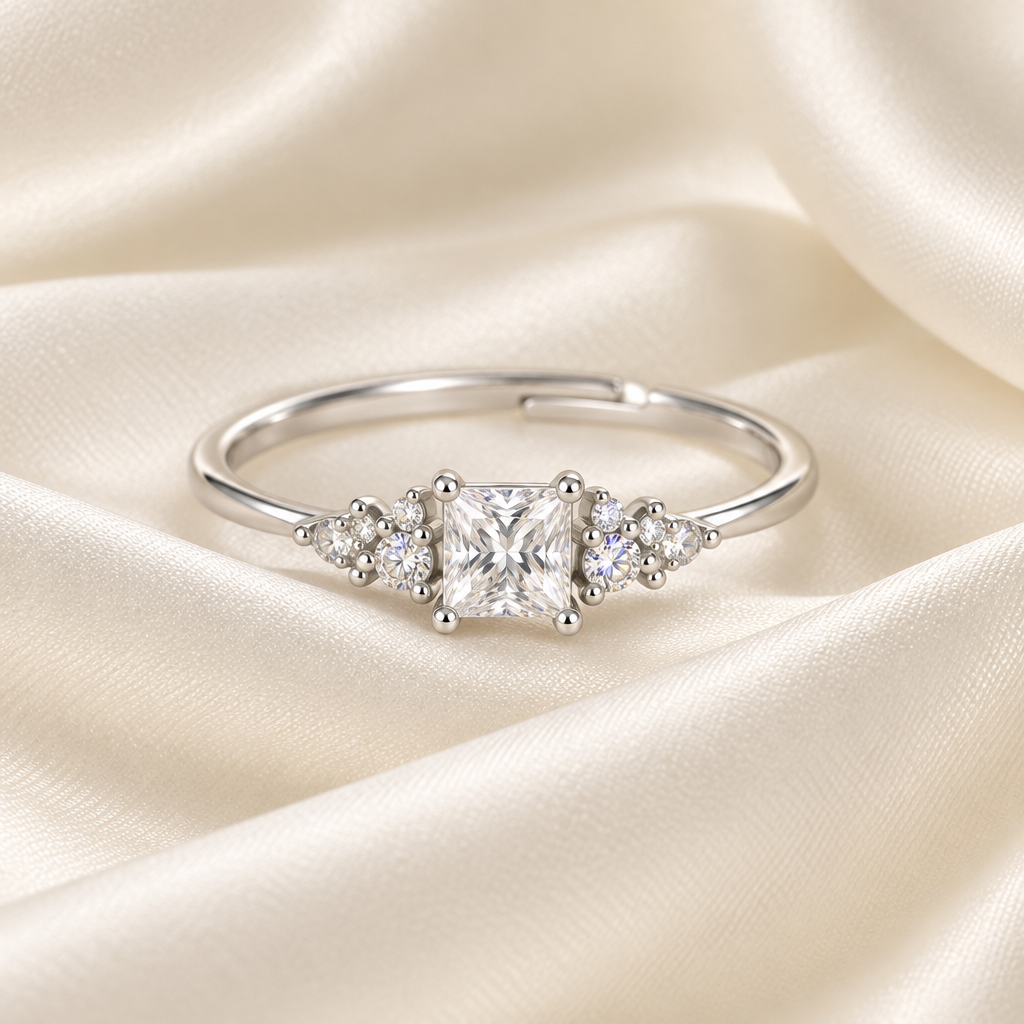 Princess-cut Moissanite ring on ivory satin